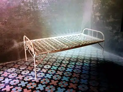 A steel-strap bed base in Chinawal village, India