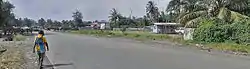 Panoramic photo of Omili market area (left) and police station (right) on Butibum Rd