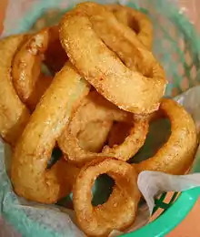 Onion rings are a form of hors d'oeuvre or side dish that generally consist of a cross-sectional, deep fried ring of onion
