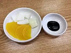 Onion, danmuji, and chunjang (typically served in Korean-Chinese restaurants)