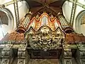 The baroque underside of the main organ.