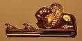 Castellani golds, made in imitation of the antique partly by incorporating original materials, 19th century, fibula with winged lion and ducks