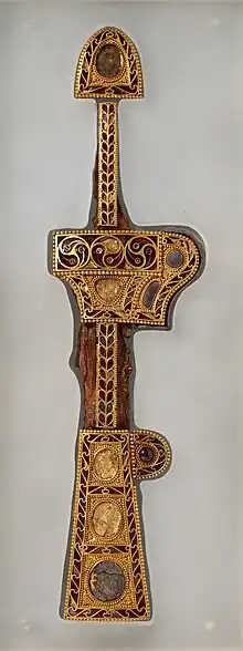 Ornamental golden dagger and sheath with glass and garnet inlays, probably originating from the Black Sea region, discovered in South Korea