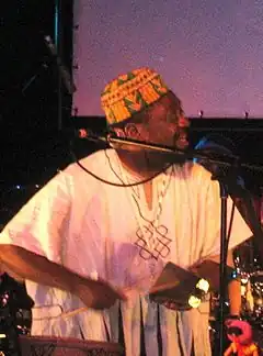 Osei performing with Osibisa in 2008