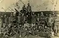 Ottoman pilots in 1914/1915 next to a Blériot XI-2 monoplane. Ahmet Ali Çelikten can be seen next to the propeller.