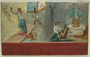 Painting in a naive style. At left a man bleeding heavily leans against a wall; in the background another man with a knife runs away. At right in a separate scene four people kneel, holding candles, before an altar with a crowned image of a woman. Four lines of writing in Spanish are at bottom, with a few other lines elsewhere.