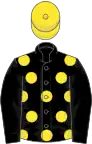 Black, yellow spots on body, yellow cap