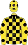 Yellow and black check, yellow sleeves, black spots, yellow cap, black spots