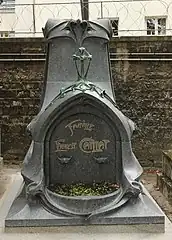 Decorative stylized lettering – Grave of the Caillat Family in the Père Lachaise Cemetery, Paris, by Hector Guimard (1899)