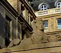 One of the sphinxes above the door