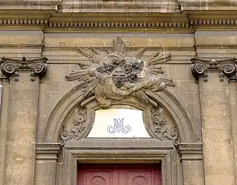 Detail of the portal, depicting a flight of angels