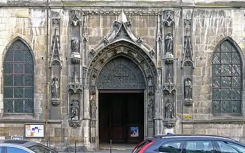 The west portal, in Flamboyant Gothic style (15th c.)