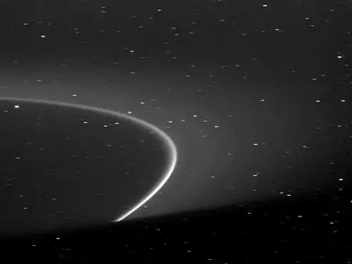 Saturn's shadow truncates the backlit G Ring and its bright inner arc. A video showing the arc's orbital motion may be viewed on YouTube or the Cassini Imaging Team website.
