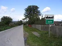 Street and road sign of Jaśle village