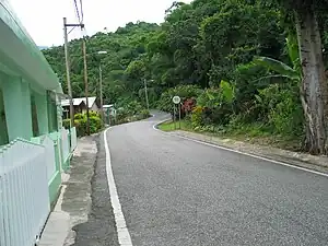 A stretch of PR-511 in the hills of Barrio Real, looking north