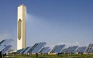 The PS10 Solar Power Plant concentrates sunlight from a field of heliostats onto a central solar power tower.