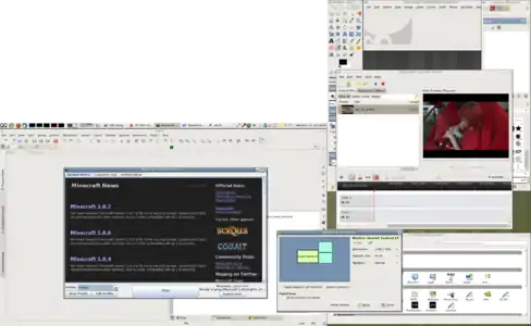 Screenshot of a PC-BSD 10.1.2 desktop (MATE) with dual monitor (dual head, pivot). The running free and open-source (FOSS) programs are: GIMP, OpenShot, file manager, Eric Python development IDE. Also shown: Minecraft 1.8.7 (with "Forge" mods).