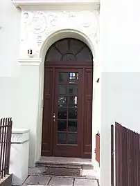 Art Nouveau portal and transom light door