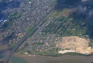 Aerial view of Pahurehure (left) and Karaka Harbourside (right) in 2012.