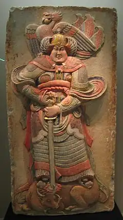 Painted stone relief depicting a warrior from the Later Liang dynasty