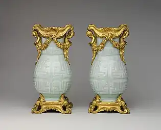 Pair of Chinese vases with French Rococo mounts; the vases: early 18th century, the mounts: 1760–70; hard-paste porcelain with gilt-bronze mounts; 32.4 x 16.5 x 12.4 cm; Metropolitan Museum of Art