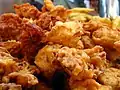 Pakoras are commonly fried with gram flour