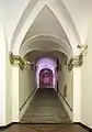 The staircase with the coat of arms of the Republic of Genoa.