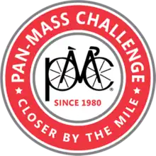Event logo, which is a bike with the tires spelling out, sort of, P M C
