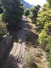 Abandoned railway line in Panagopoula. It used to be part of the now-closed metric railway line Athens-Corinth-Patras. A new railway tunnel is under construction.