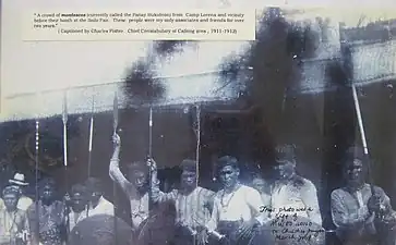 Panay Bukidnon tribesmen posing with wooden Taming shields