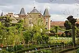 Flower beds and buildings at Jardin botanique du Thabor