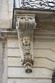 Rococo Native American mascaron on a corbel of a balcony of the Hôtel de Salm-Dyck (Rue du Bac no. 97), Paris, designed by François Debias-Aubry, 1722