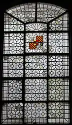 A leadlight window set with an heraldic shield (1840s) in the church of St. Paul and St. Louis,  Paris