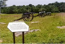 Photo shows three Civil War era cannons, probably one 3-inch Ordnance rifle and two 12-pounder howitzers.