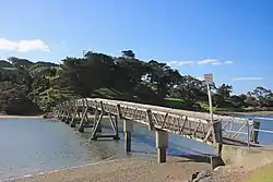 Footbridge across the Pataua River joining North Pataua and South Pataua