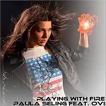 Seling holding a fireball in her right hand.