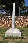 Monument in memory of the 1998 embassy bomb blast victims from Nairobi (Kenya) and Dar es Salaam (Tanzania). Shows an unusual vertical arrangement of the engraved text.