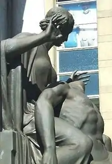 Part of Bolton War Memorial-Peace seeing the horrors of war.