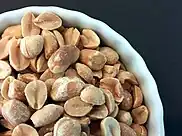 Close-up of shelled peanuts in a bowl