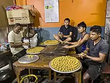 peda Makers at Bokakhat, Assam, India. Bokakhat is famous for its peda Industry