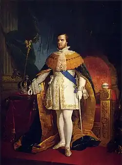 A painted, full-length portrait of a young man standing before a throne and wearing robes of state while on a table at his right hand rest an arched crown and scepter