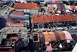 Colonial shophouses with Back Lane in George Town, Penang, 1991.