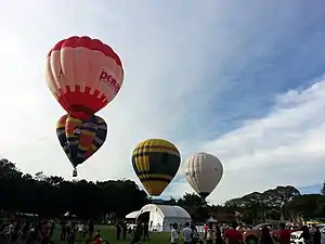 Balloons flying during the Penang Hot Air Balloon Fiesta in George Town, Penang in 2017.
