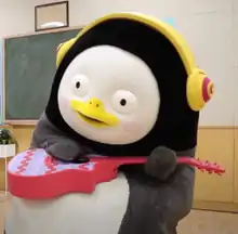 Penguin character "Pengsoo" holding an instrument