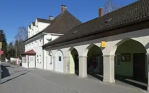 Three-story building with hipped roof