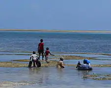 Group of beachgoers at Nyali Beach.