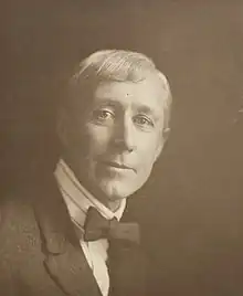 A black and white photograph of Percy Lindsay