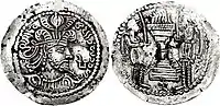 Coin of Peroz in the name of Varahran I. Obverse:' Crowned bust with Sasanian headgear and ram horns; Brahmi  “Pi” to right/ Reverse: Fire altar with attendants and ribbons; Brahmi “Nam” in exergue.