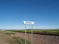 Sign along the railroad tracks in Petrel, North Dakota