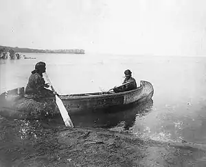 Ojibwe women in canoe on Leech Lake, Bromley 1896